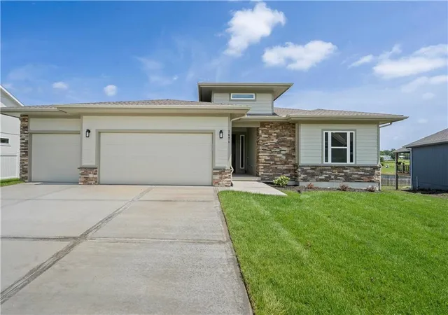 1st image of 1835 Woodward Cir, Raymore, MO 64083 | MLS# 2614208