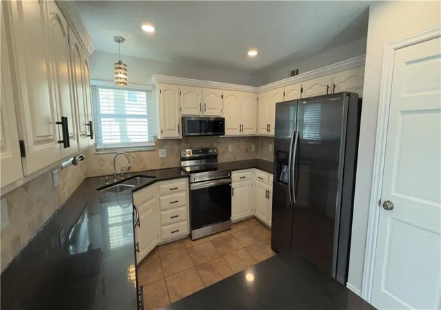 Photo 4 of Sale Pending at 1397 S Brentwood Dr, Olathe, KS 66062 | MLS# 2614446 | Listing updated on 2026-09-03