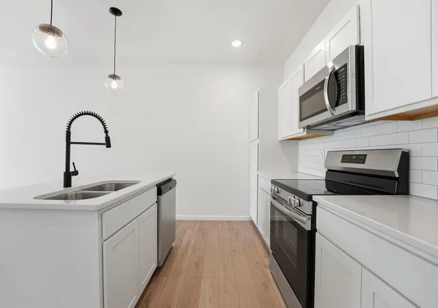 Photo 4 of Townhouse for sale at 12403 S Acacia Dr, Lee's Summit, MO 64086 | MLS# 2615337 | Listing updated on 2026-09-06