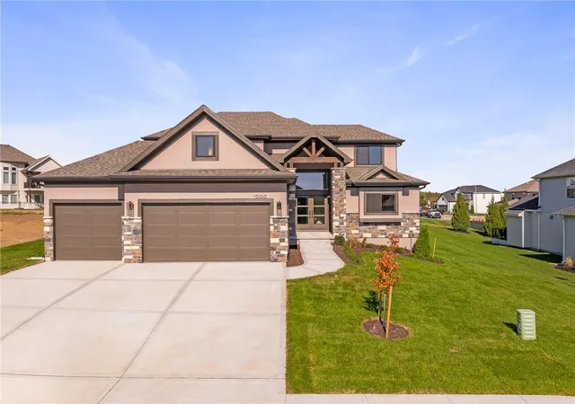Single family home for sale at 1000 Rannoch Dr, Raymore, MO 64083 | MLS# 2615904