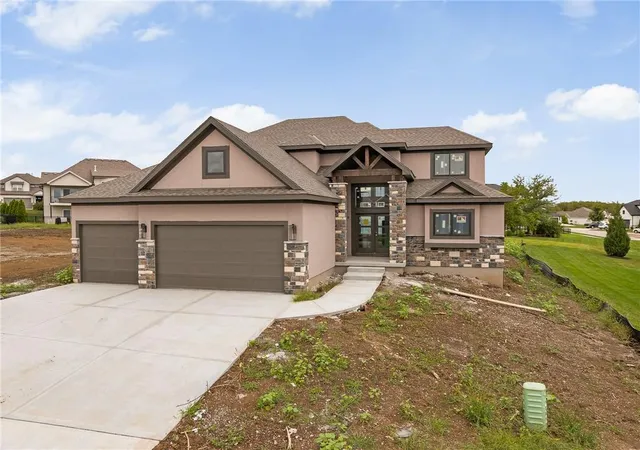 Photo 2 of Single family home for sale at 1000 Rannoch Dr, Raymore, MO 64083 | MLS# 2615904 | Listing updated on 2026-09-23