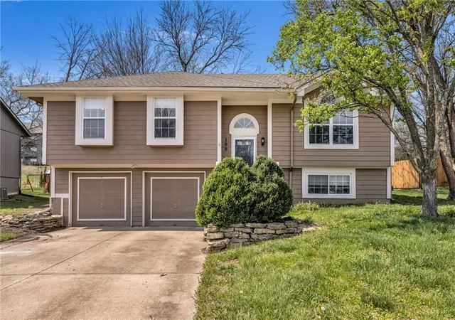 1st image of 100 N Darrowby Dr, Raymore, MO 64083 | MLS# 2616093