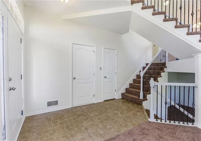 4th image of 622 Johnston Pkwy, Raymore, MO 64083 | MLS# 2620358