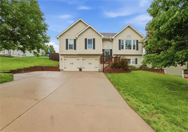 1st image of 210 E Whispering Hills Blvd, Lone Jack, MO 64070 | MLS# 2620980