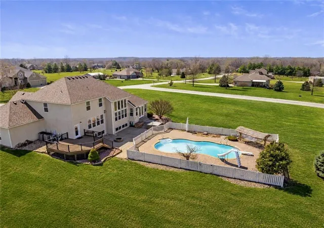 1st image of 24611 Woodland Cir, Lees Summit, MO 64086 | MLS# 2621103