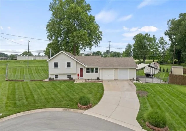 Single family home for sale at 420 NW Village Ct, Lee's Summit, MO 64063 | MLS# 2621799