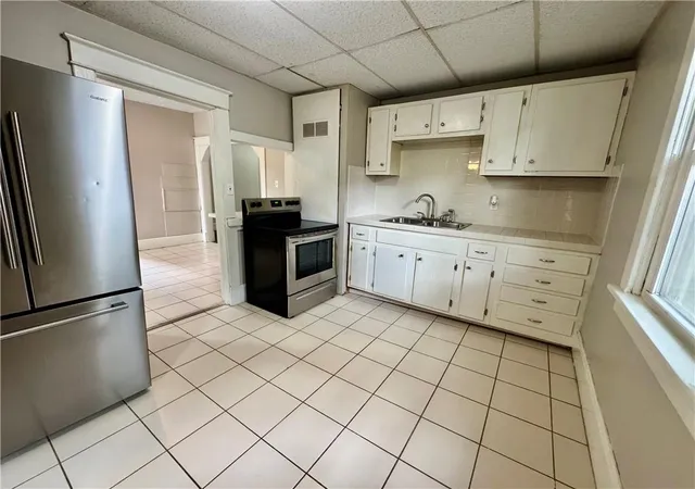 Photo 4 of Sale Pending at 709 Rhodes St, Grandview, MO 64030 | MLS# 2625230 | Listing updated on 2026-09-13