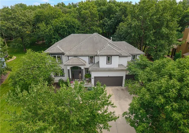 Photo 1 of Single family home for sale at 9129 Redbud Ln, Lenexa, KS 66220 | MLS# 2625854 | Listing updated on 2026-10-03