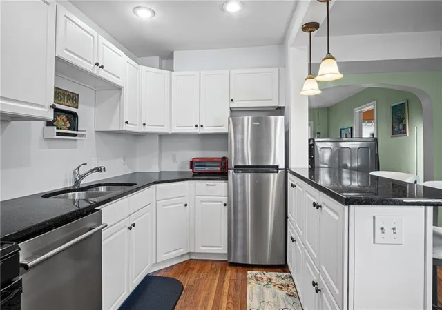 Listing Photo 5 - Condo for sale in building located at 212 Emanuel Cleaver Ii Blvd, Kansas City, MO 64112 - Unit #2