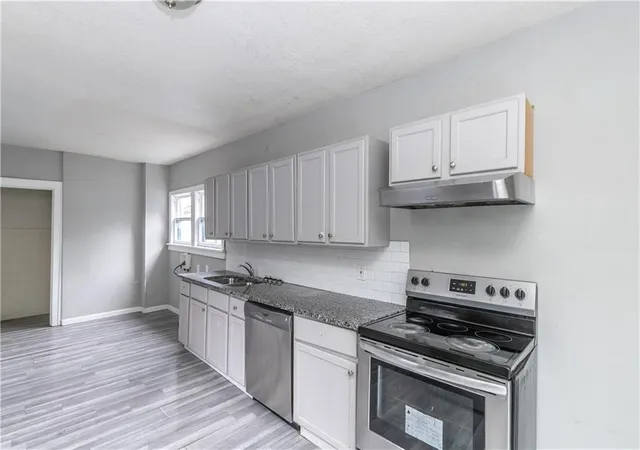 Photo 2 of Single family home for sale at 809 Monroe Ave, Kansas City, MO 64124 | MLS# 2627444 | Listing updated on 2026-08-19