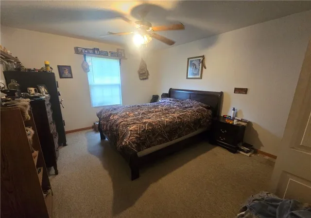 Listing Photo 2 - Condo for sale in building located at 704 Central St, Wellington, MO 64097 - Unit #