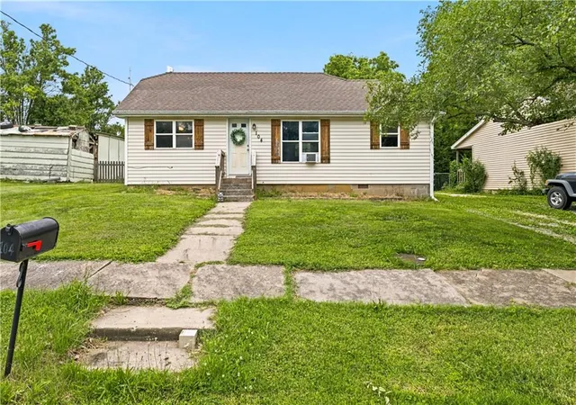 1st image of 104 W 4th St, Freeman, MO 64746 | MLS# 2628157