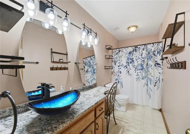 Photo 4 of Single family home for sale at 403 Woodland Ave, Smithville, MO 64089 | MLS# 2629714 | Listing updated on 2026-10-05
