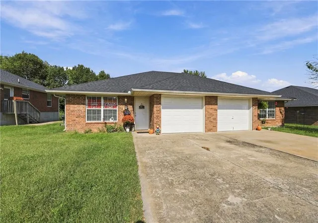 Photo 1 of Multi family home for sale at 204 Nw & 206 Woodbury Dr, Grain Valley, MO 64029 | MLS# 2629891 | Listing updated on 2026-10-06