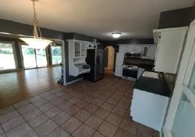 4th image of 16405 Spring Valley Rd, Belton, MO 64012 | MLS# 2630272