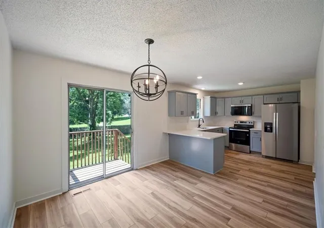 Photo 3 of Sale Pending at 318 SE Bent Tree Dr, Blue Springs, MO 64014 | MLS# 2630990 | Listing updated on 2026-09-08