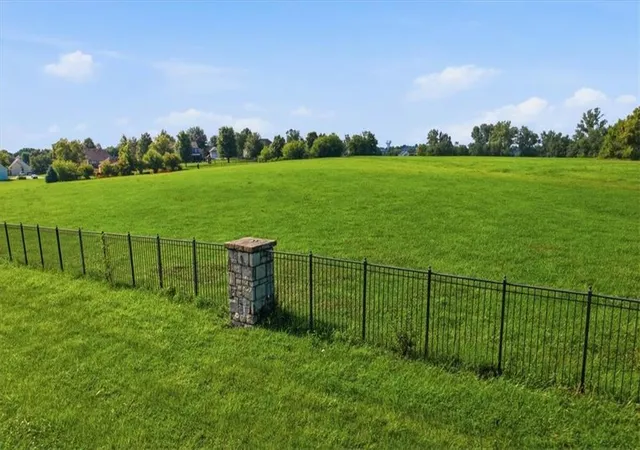 1st image of 457 E Lucy Webb Rd, Raymore, MO 64083 | MLS# 2631150