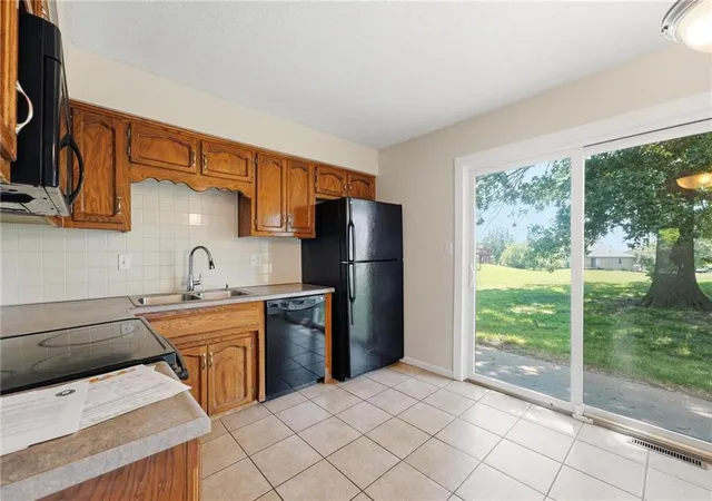 Photo 3 of Multi family home for sale at 8709 N Hull Ave, Kansas City, MO 64154 | MLS# 2631637 | Listing updated on 2026-08-29