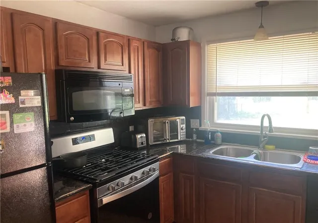 Photo 3 of Single family home for sale at 11902 Fremont Ave, Grandview, MO 64030 | MLS# 2631734 | Listing updated on 2026-10-06