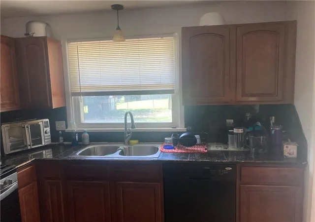 Photo 4 of Single family home for sale at 11902 Fremont Ave, Grandview, MO 64030 | MLS# 2631734 | Listing updated on 2026-10-06