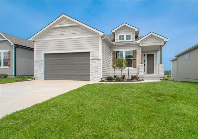 Single family home for sale at 1148 SW Whitby Dr, Raymore, MO 64083 | MLS# 2632400