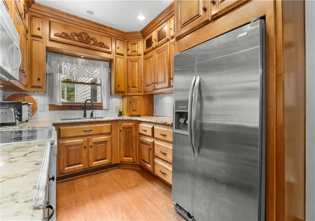 Photo 2 of Single family home for sale at 11219 Evans St, Sugar Creek, MO 64054 | MLS# 2632453 | Listing updated on 2026-10-05