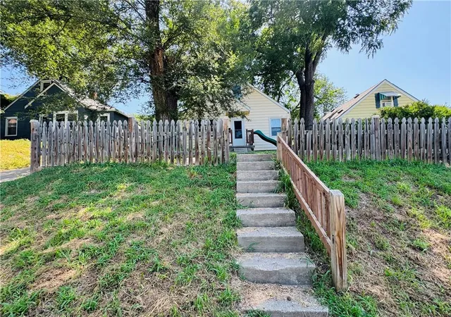 Photo 2 of Single family home for sale at 445 N Quincy Ave, Kansas City, MO 64123 | MLS# 2632573 | Listing updated on 2026-07-21