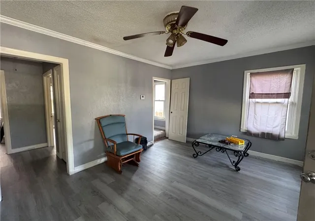 Photo 3 of Single family home for sale at 445 N Quincy Ave, Kansas City, MO 64123 | MLS# 2632573 | Listing updated on 2026-07-21