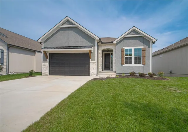 Single family home for sale at 1152 SW Whitby Dr, Raymore, MO 64083 | MLS# 2632758