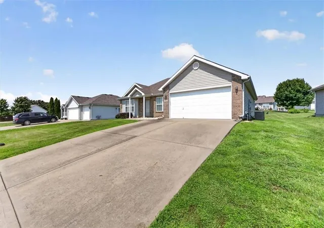 Photo 3 of Single family home for sale at 1104 Carlisle Dr, Raymore, MO 64083 | MLS# 2633438 | Listing updated on 2026-09-13
