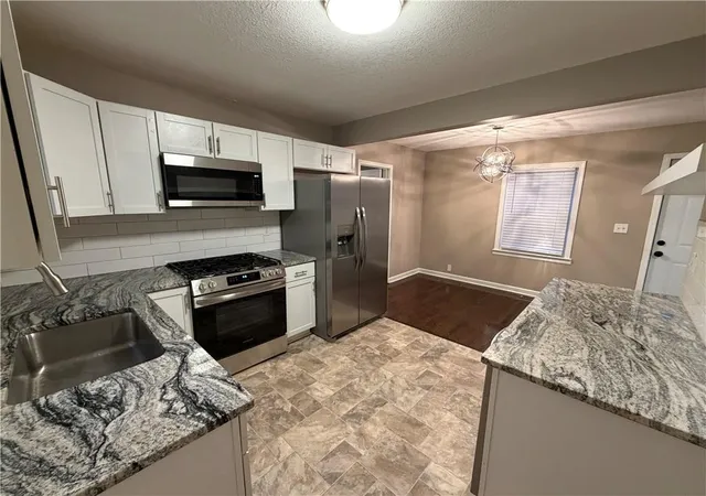 Photo 2 of Single family home for sale at 1614 E 85th Street, Kansas City, MO 64131 | MLS# 2633776 | Listing updated on 2026-10-13