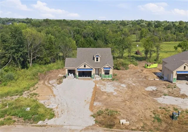 Photo 2 of Single family home for sale at 21401 Twin Oaks Pkwy, Peculiar, MO 64078 | MLS# 2634568 | Listing updated on 2026-10-07