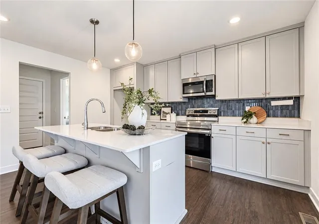 Photo 3 of Single family home for sale at 1413 Newport Ln, Raymore, MO 64083 | MLS# 2634590 | Listing updated on 2026-09-26