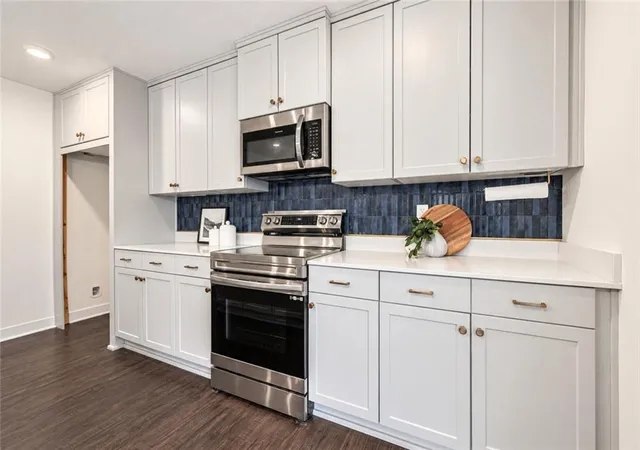 Photo 4 of Single family home for sale at 1413 Newport Ln, Raymore, MO 64083 | MLS# 2634590 | Listing updated on 2026-09-26