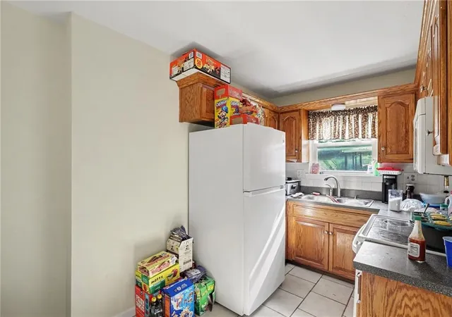 Listing Photo 5 - Condo for sale in building located at 5604 NE 50th St, Kansas City, MO 64119