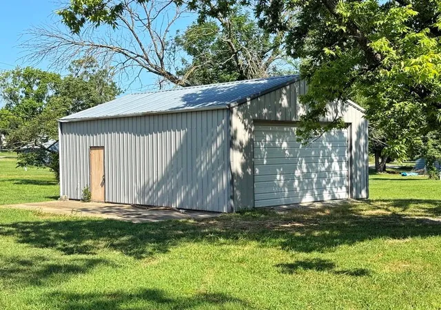 1st image of 111 E Poplar St, El Dorado Springs, MO 64744 | MLS# 2635328
