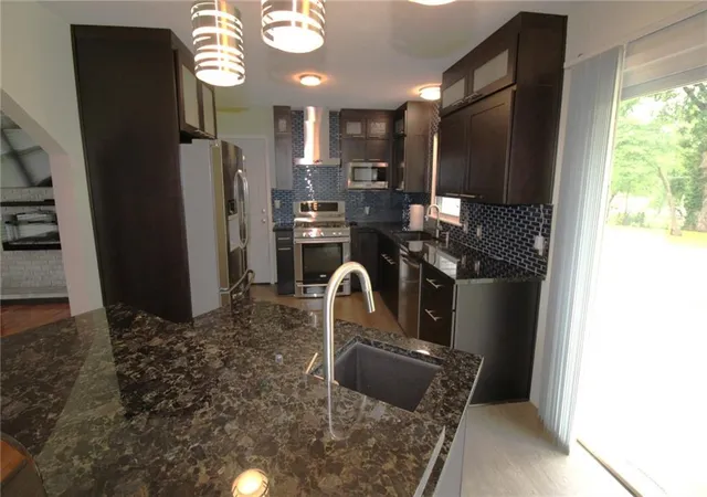 Photo 4 of Sale Pending at 5815 N Tracy Ave, Kansas City, MO 64118 | MLS# 2636042 | Listing updated on 2026-08-22