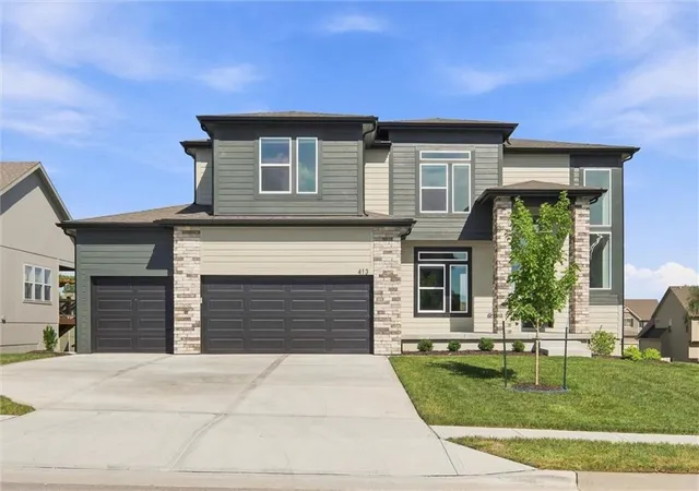 1st image of 413 Woodview Dr, Raymore, MO 64083 | MLS# 2636061