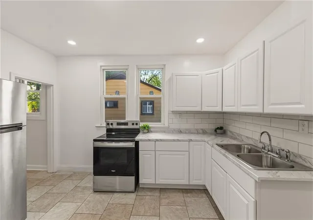 Photo 3 of Single family home for sale at 6010 Kenwood Ave, Kansas City, MO 64110 | MLS# 2636612 | Listing updated on 2026-08-13