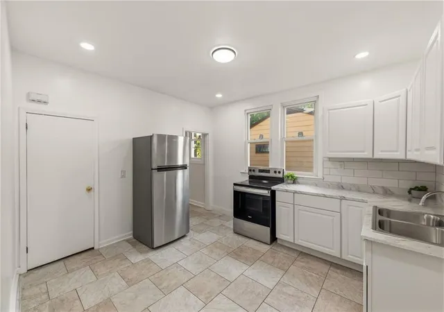 Photo 4 of Single family home for sale at 6010 Kenwood Ave, Kansas City, MO 64110 | MLS# 2636612 | Listing updated on 2026-08-13