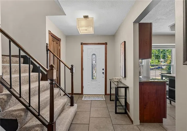 Photo 3 of Sale Pending at 8205 Caenen Lake Rd, Lenexa, KS 66215 | MLS# 2636785 | Listing updated on 2026-08-31