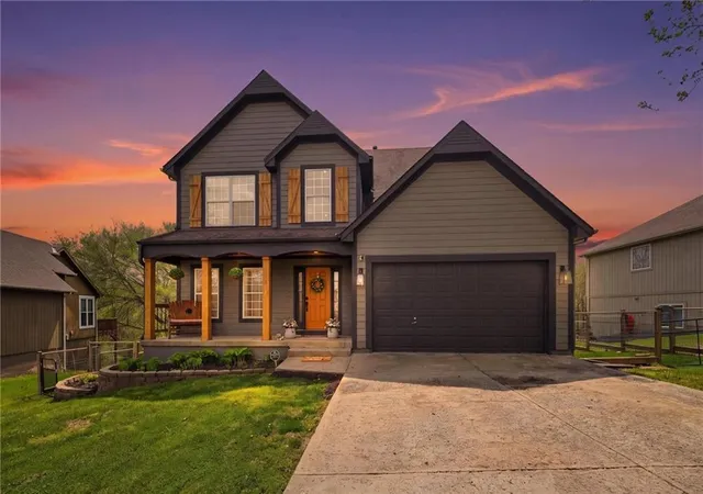 2nd image of 215 E Whispering Hills Blvd, Lone Jack, MO 64070 | MLS# 2636817
