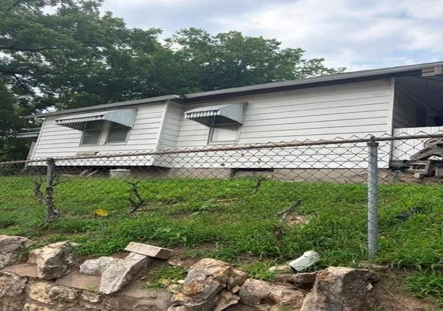 Photo 2 of Single family home for sale at 400 N Belmont Ave, Kansas City, MO 64123 | MLS# 2636865 | Listing updated on 2026-08-26