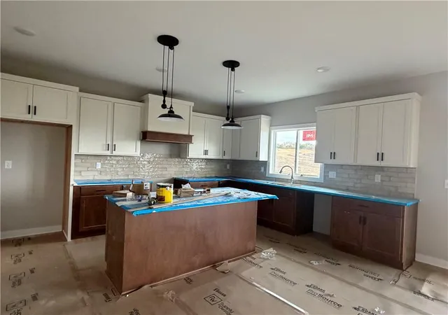 Photo 3 of Single family home for sale at 834 Reed Dr, Raymore, MO 64083 | MLS# 2636939 | Listing updated on 2026-09-29