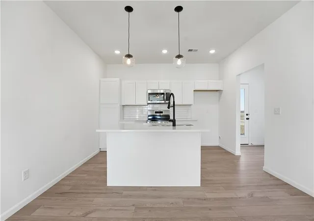 Photo 3 of Townhouse for sale at 12415 S Acacia Dr, Lee's Summit, MO 64086 | MLS# 2637093 | Listing updated on 2026-08-16