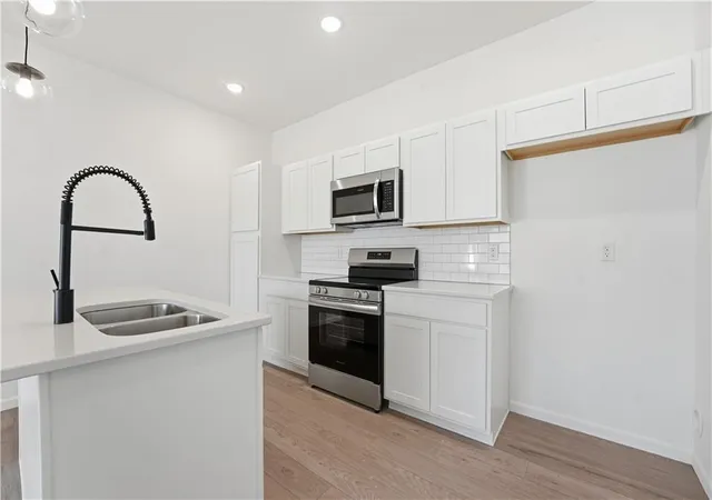 Photo 4 of Townhouse for sale at 12413 S Acacia Dr, Lee's Summit, MO 64086 | MLS# 2637099 | Listing updated on 2026-09-25
