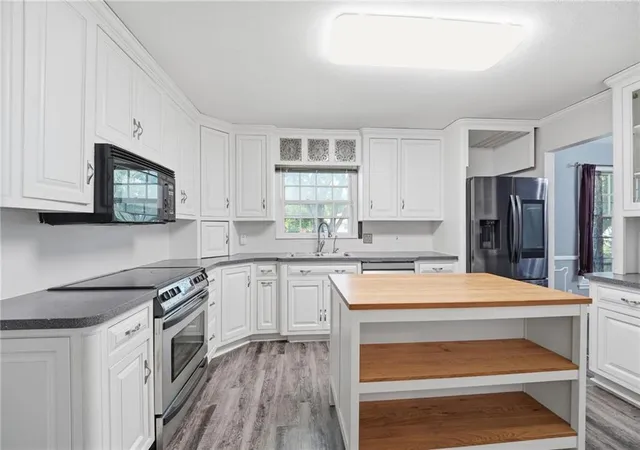 Photo 3 of Sale Pending at 1002 E Willow Dr, Olathe, KS 66061 | MLS# 2637815 | Listing updated on 2026-09-06
