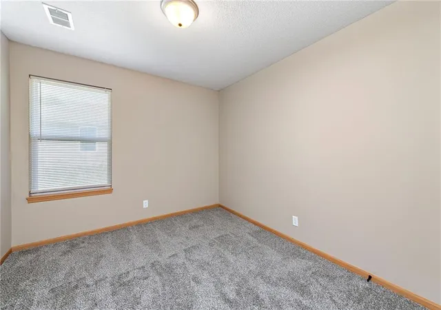 Listing Photo 2 - Condo for sale in building located at 4880 Queen Ridge Ave, Kansas City, MO 64136 - Unit #