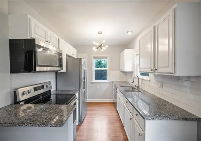 Photo 3 of Single family home for sale at 5987 Paseo Blvd, Kansas City, MO 64110 | MLS# 2637902 | Listing updated on 2026-09-13