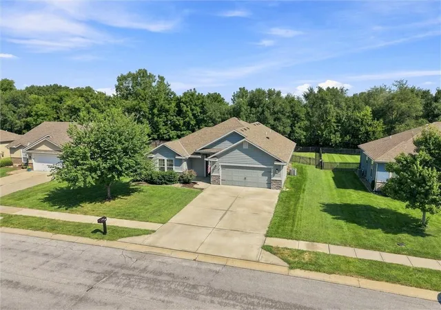 Photo 2 of Sale Pending at 308 E Olive St, Raymore, MO 64083 | MLS# 2637948 | Listing updated on 2026-09-02